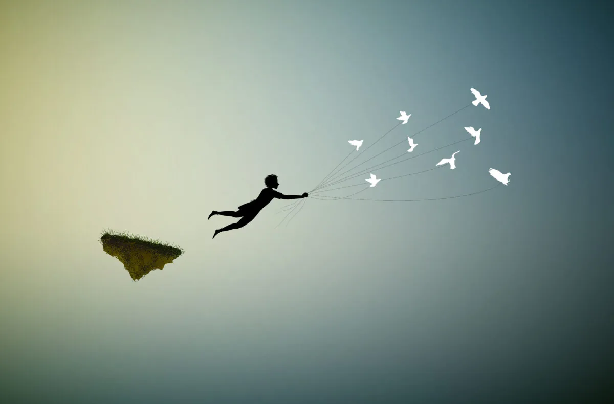 Sunrise Method #1 take-off: silhouette of a boy flying up from a floating island, pulled by white doves on strings